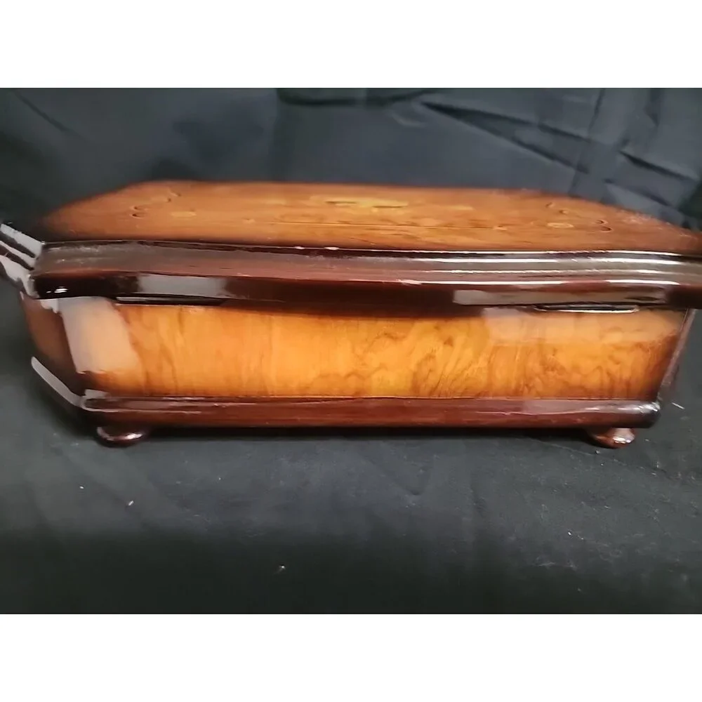 wooden jewelry box with violin pictured‎ on top